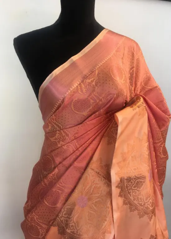 Peach Kora Silk Saree highlighted with zari weaves