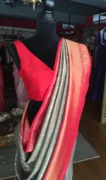 Grey Banarasi Silk Saree highlighted with gold and silver zari weaves