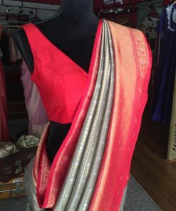 Grey Banarasi Silk Saree highlighted with gold and silver zari weaves