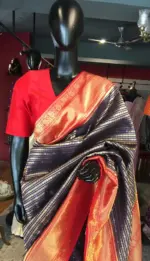 Navy Blue Banarasi Silk Saree highlighted with gold and silver zari weaves