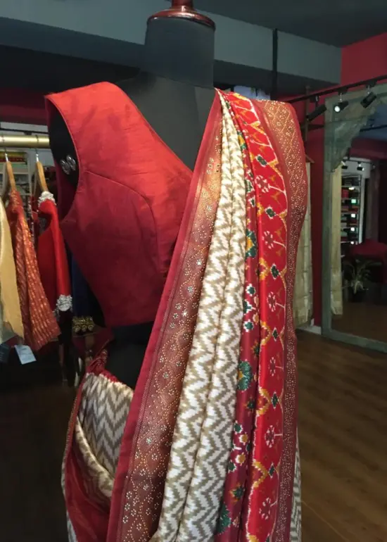 Offwhite Banarasi Soft Silk Saree highlighted with Patola Weaves