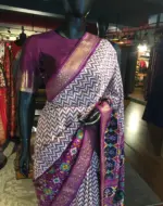 Offwhite Banarasi Soft Silk Saree highlighted with Patola Weaves