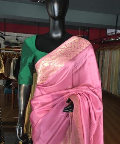 Onion pink Dola Silk Saree highlighted with Gold Zari Border