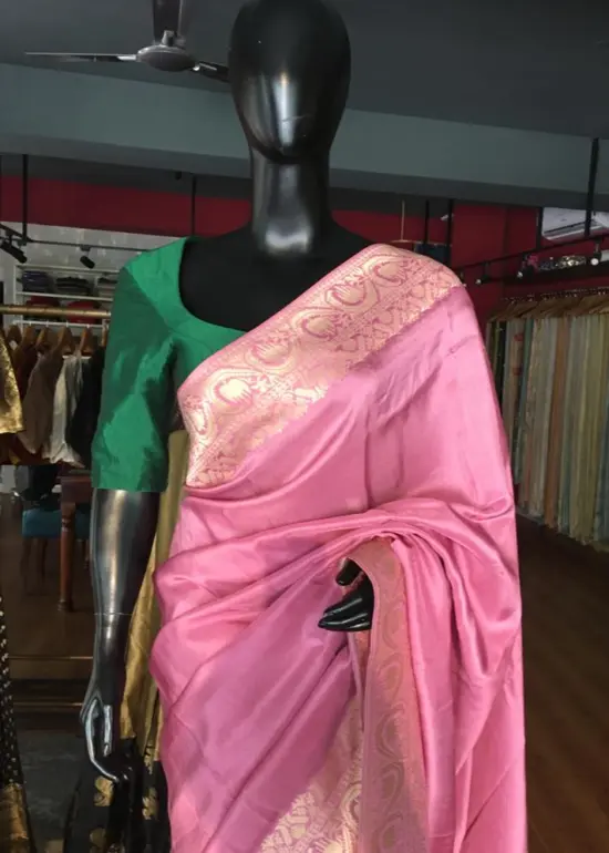 Onion pink Dola Silk Saree highlighted with Gold Zari Border