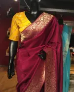 Burgundy  Dola Silk Saree highlighted with Gold Zari Border