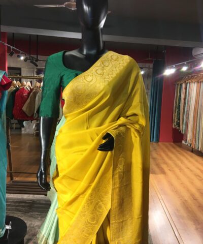 Yellow Dola Silk Saree highlighted with Gold Zari Border
