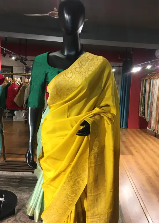 Yellow Dola Silk Saree highlighted with Gold Zari Border
