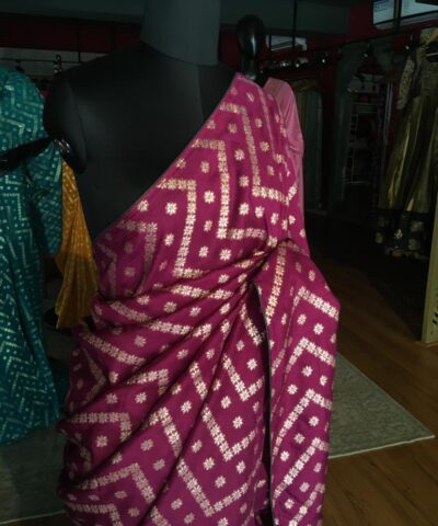 Majenta Dola Silk Saree highlighted with Zari Weaves
