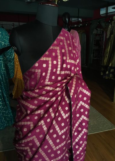 Majenta Dola Silk Saree highlighted with Zari Weaves