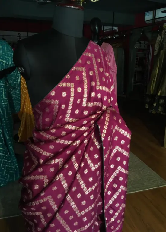 Majenta Dola Silk Saree highlighted with Zari Weaves