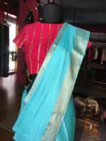 Blue Dola Silk Saree highlighted with Gold Zari Border