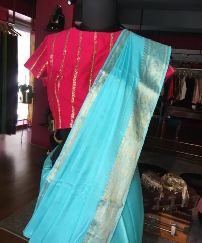 Blue Dola Silk Saree highlighted with Gold Zari Border