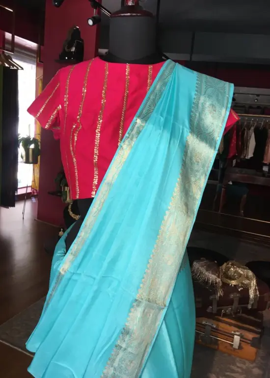 Blue Dola Silk Saree highlighted with Gold Zari Border