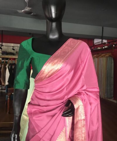 Onion pink Dola Silk Saree highlighted with Gold Zari Border