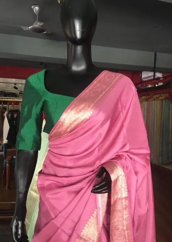 Onion pink Dola Silk Saree highlighted with Gold Zari Border