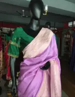 Lilac Dola Silk Saree highlighted with Gold Zari Border