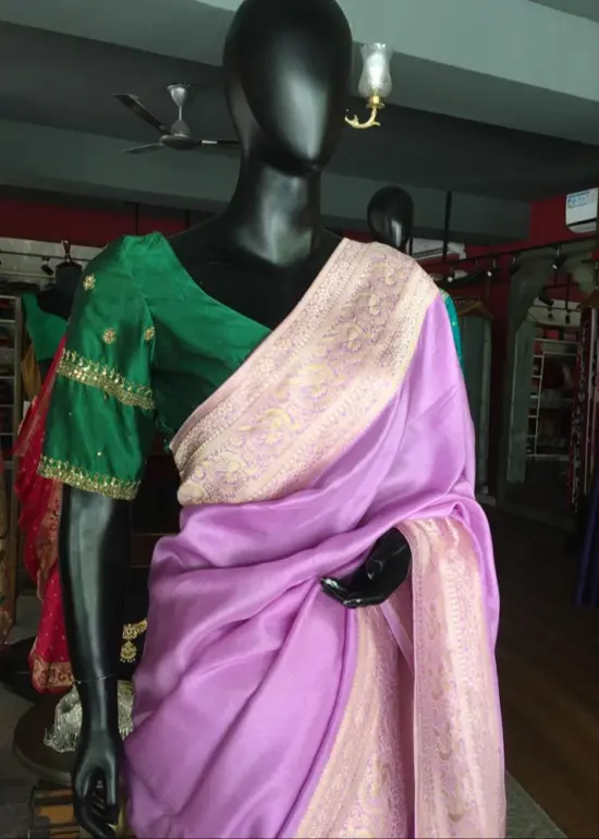 Lilac Dola Silk Saree highlighted with Gold Zari Border