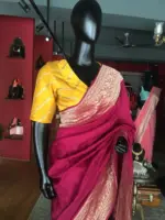 Burgundy Dola Silk Saree highlighted with Gold Zari Border