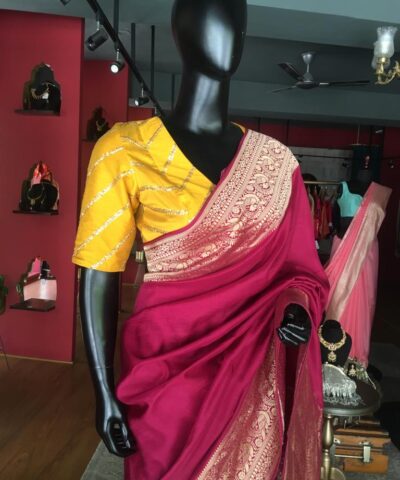 Burgundy Dola Silk Saree highlighted with Gold Zari Border