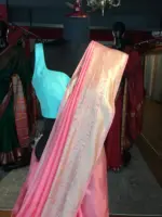 Peach Dola Silk Saree highlighted with Gold Zari Border