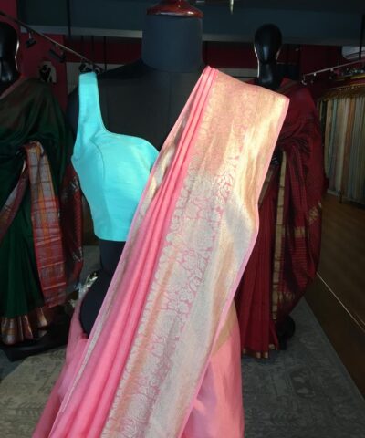Peach Dola Silk Saree highlighted with Gold Zari Border