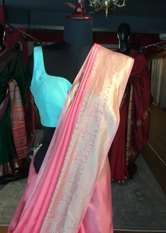 Peach Dola Silk Saree highlighted with Gold Zari Border