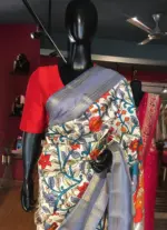 Off White Printed Banarasi Silk Saree highlighted with contrast border