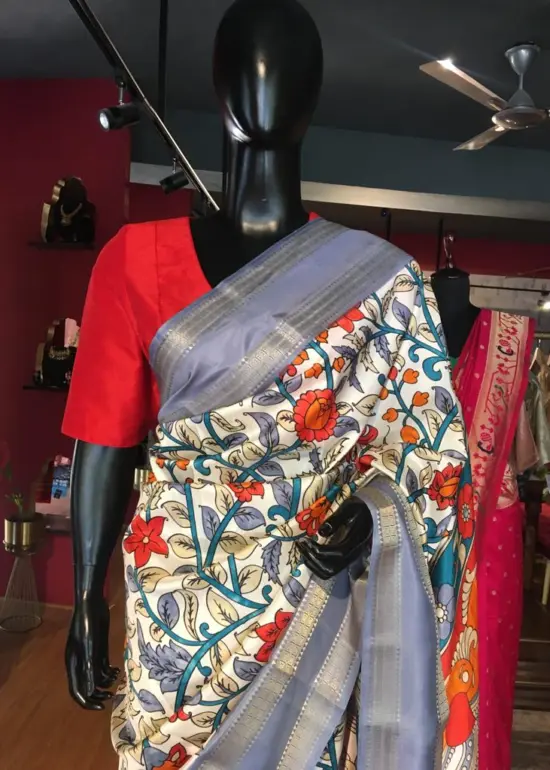Off White Printed Banarasi Silk Saree highlighted with contrast border