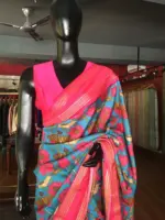 Blue Printed Banarasi Silk Saree highlighted with contrast border