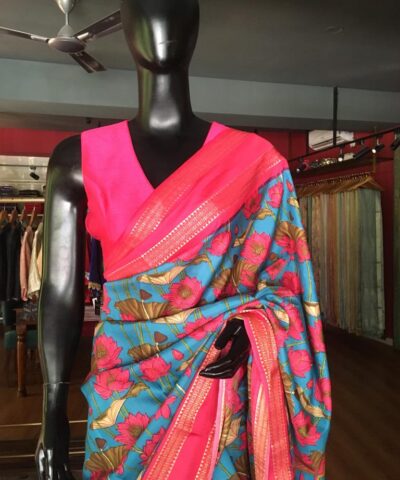 Blue Printed Banarasi Silk Saree highlighted with contrast border