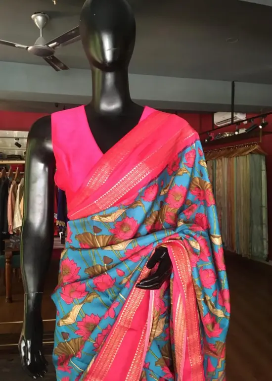 Blue Printed Banarasi Silk Saree highlighted with contrast border