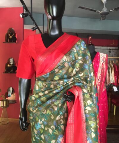 Green Printed Banarasi Silk Saree highlighted with contrast border