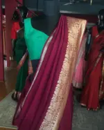 Burgundy Dola Silk Saree highlighted with Gold Zari Border