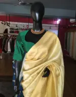 Yellow Banarasi Silk Saree highlighted with Gold and Silver zari weaves