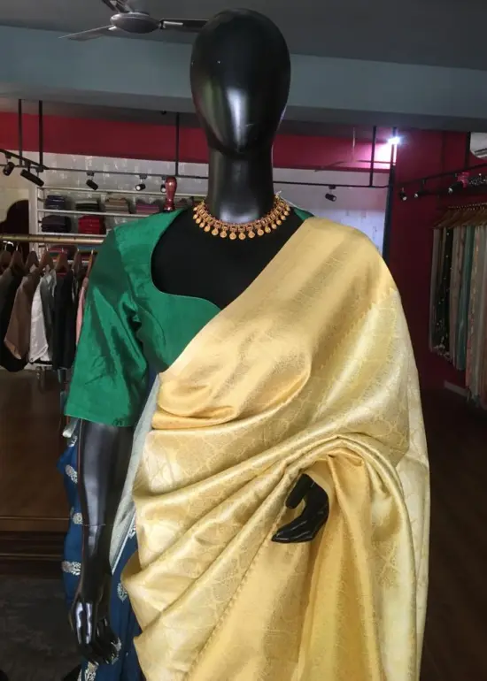 Yellow Banarasi Silk Saree highlighted with Gold and Silver zari weaves