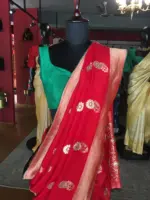 Red Dola Silk Saree highlighted with Gold Zari Border