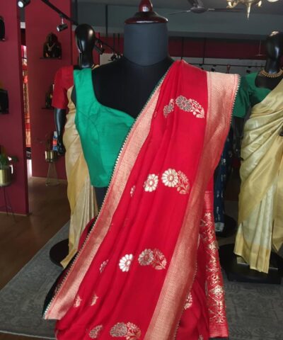 Red Dola Silk Saree highlighted with Gold Zari Border