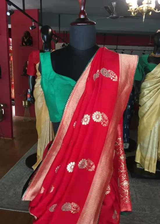 Red Dola Silk Saree highlighted with Gold Zari Border