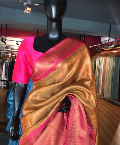 Peach Kora Silk Saree Highlighted With Zari Weaves