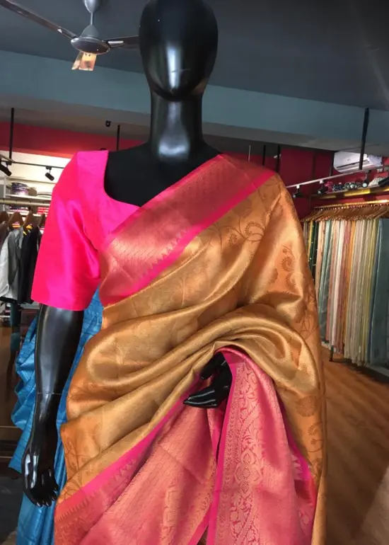 Peach Kora Silk Saree Highlighted With Zari Weaves