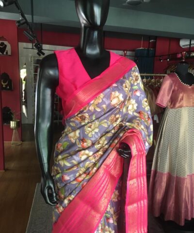 Lilac Printed Banarasi Silk Saree highlighted with contrast border