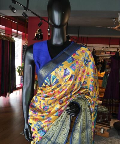 Yellow Printed Banarasi Silk Saree highlighted with contrast border