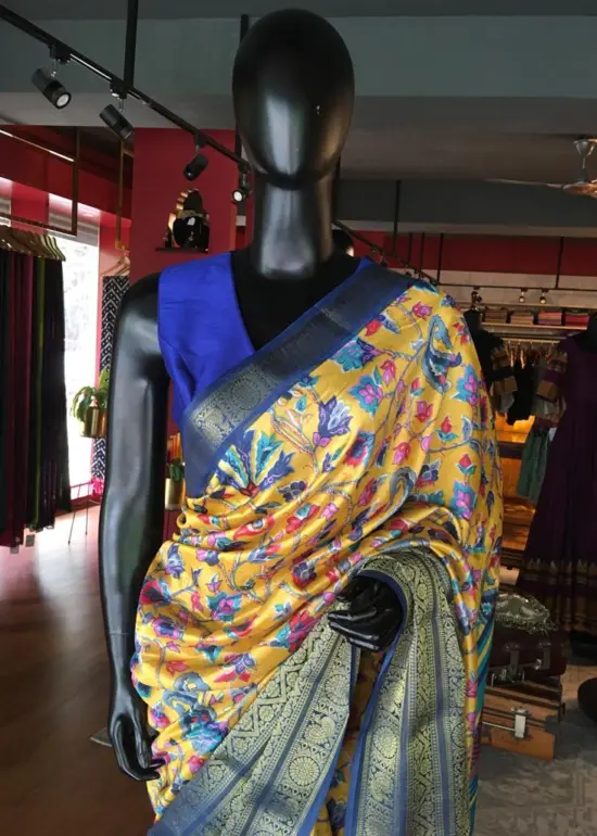 Yellow Printed Banarasi Silk Saree highlighted with contrast border