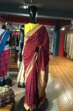 Maroon Crepe Silk Saree with Beautiful Gold Zari Buttas highlighted with Gold Woven Border - Image 2