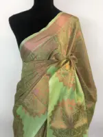 Pista Green Kora Silk Saree highlighted with zari weaves