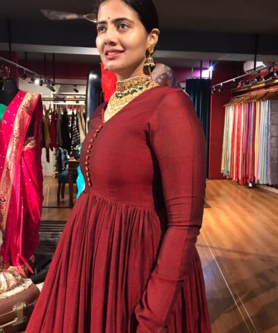 Maroon Cotton Dress highlighted with Kanchi Silk Border
