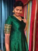Green Silk Dress adorned with Hand Embroidery