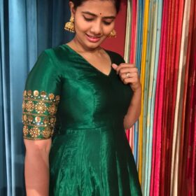 Green Silk Dress adorned with Hand Embroidery