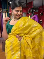 Yellow Banarasi Silk Saree highlighted with Leheriya Weaves