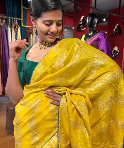 Yellow Banarasi Silk Saree highlighted with Leheriya Weaves
